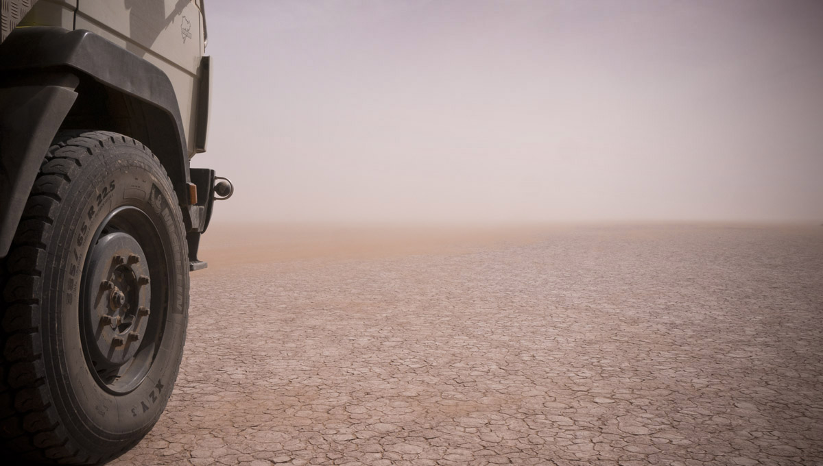 Overland truck in Sahara desert